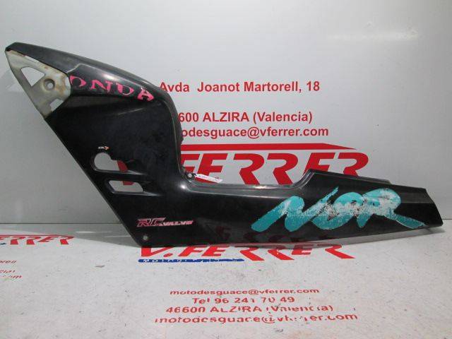 Tapa lateral izquierda de repuesto de una moto Honda NSR 125 F del año 1990